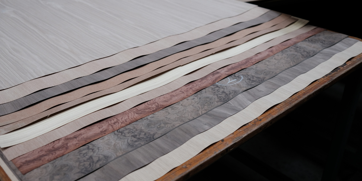 a variety of wood veneer sheets stacked on top of each other