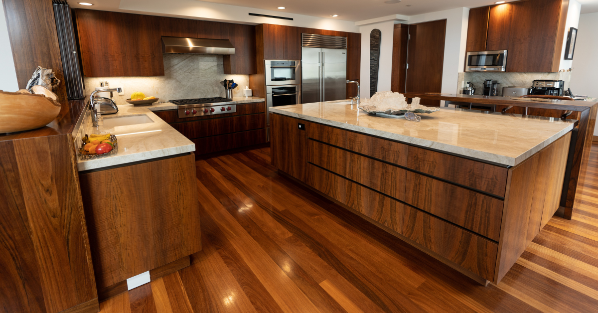a kitchen with all wood veneer cabinetry